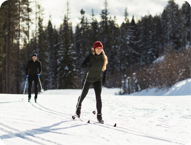 Couple cross country skiing