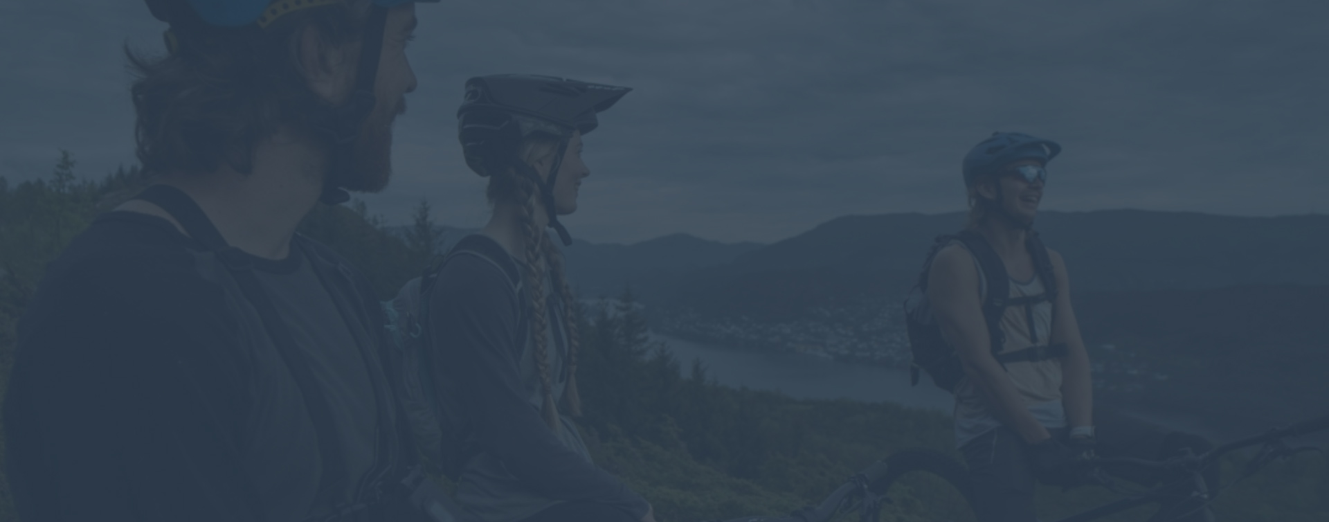 Group of friends mountain biking