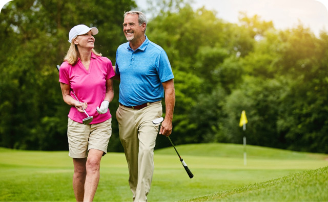 Happy couple on golf course