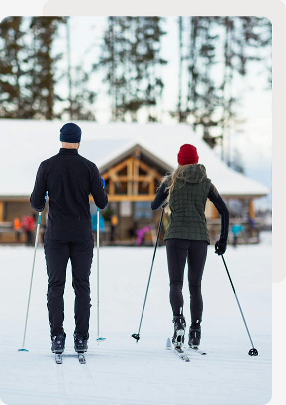 Couple Skiing Near Northstar Group Resort